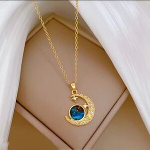 Elegant Gold and Blue Crescent Necklace